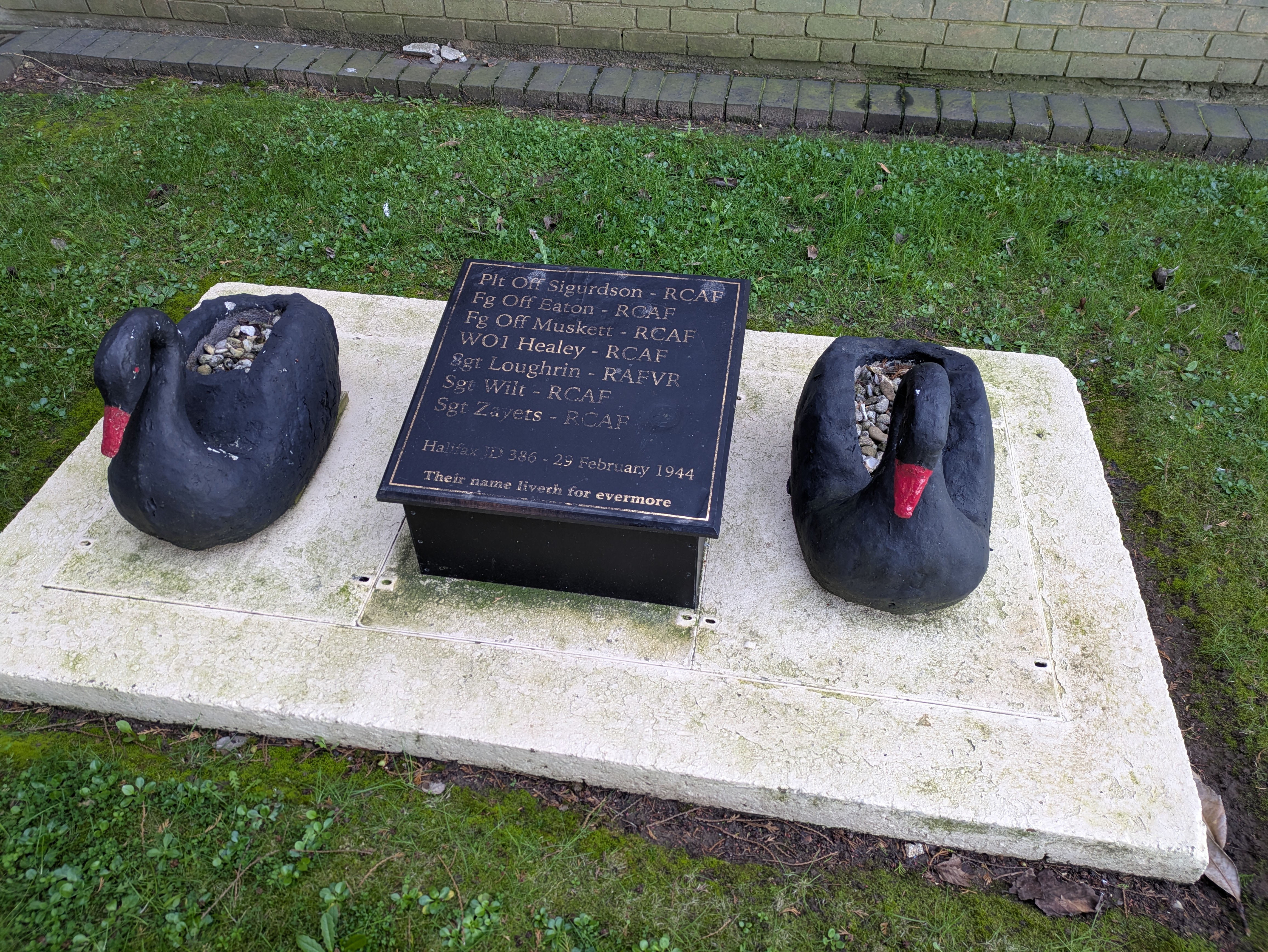 The Black Swan Memorial at RAF Elsham Wolds, showing crew names of Pilot Officer Sigurdson and crew