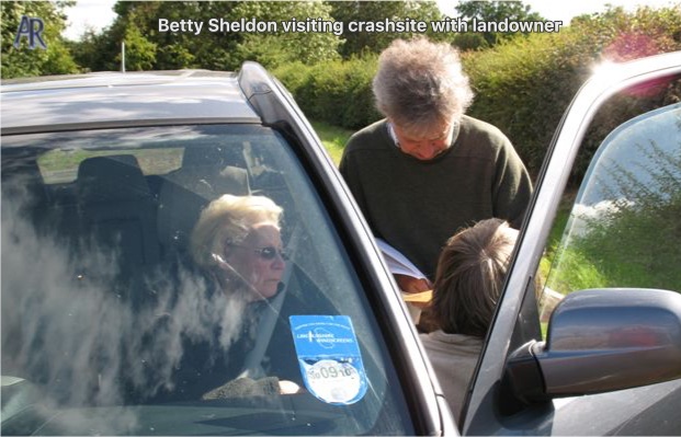 betty sheldon visiting crashsite with landowner